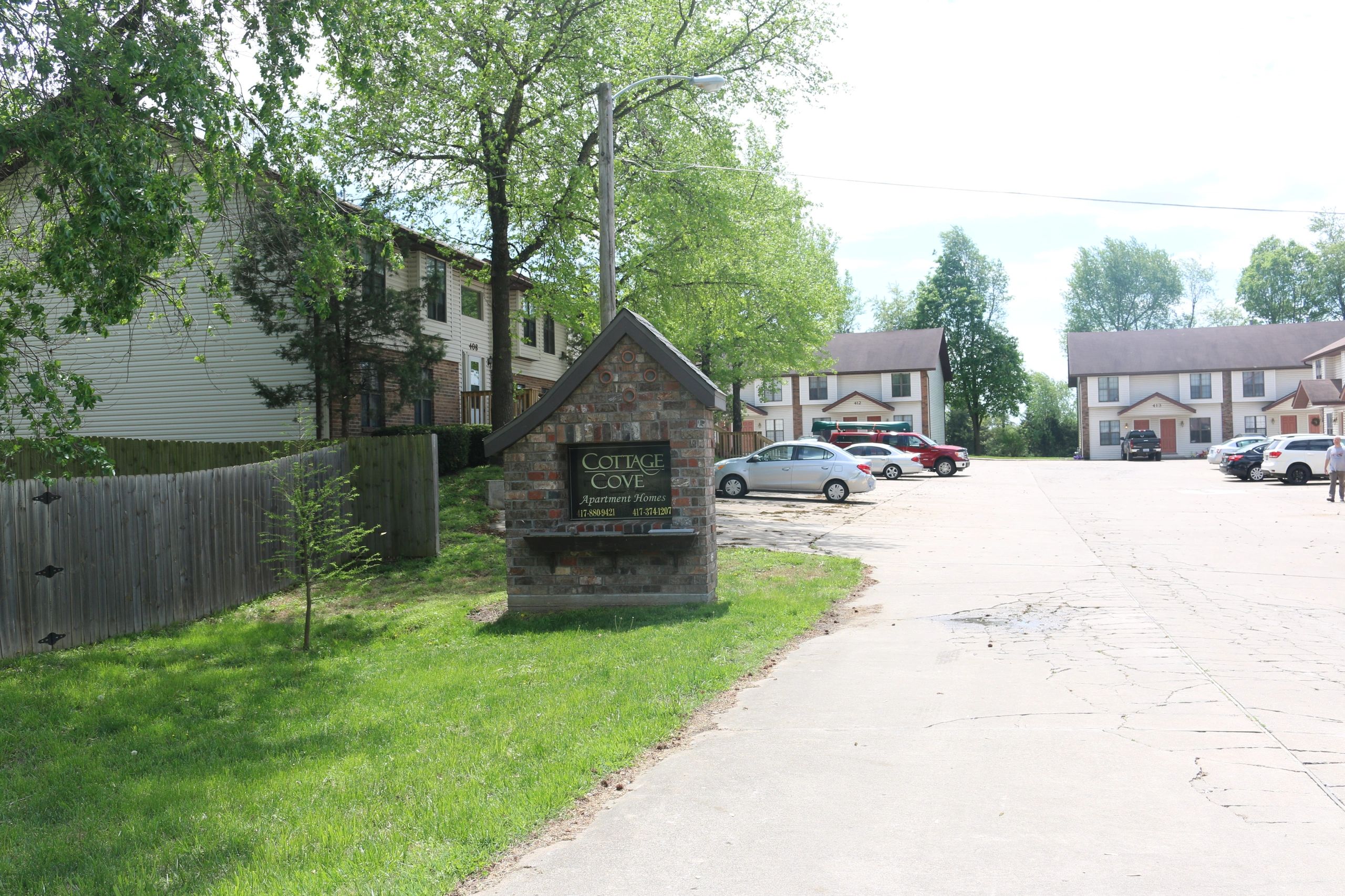 Cottage Cove apartment homes entrance sign in Nixa